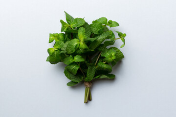 Mint leaf. Fresh mint on Colored background. Mint leaves isolated Top view with copy space © sosiukin