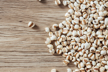 Close-Up of Raw Organic Grains on Wooden Surface for Culinary Use