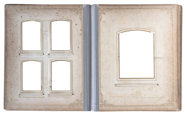 Open vintage photo album with multiple decorative frames and empty picture windows on aged paper pages