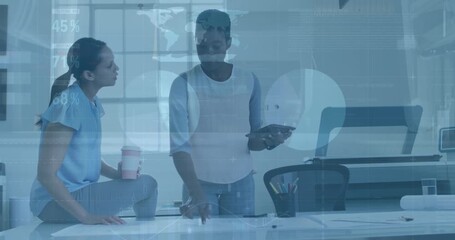 Animation of financial data processing over diverse business people using laptop - Powered by Adobe