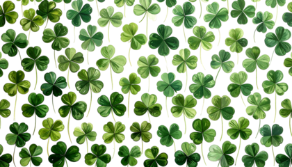 Dense field of green shamrocks, varying shades & leaf patterns