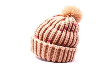 Cozy knitted beanie with pom pom for winter warmth