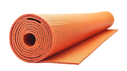 A vibrant orange yoga mat rolled up on a black background