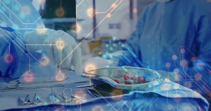 Circuit overlay appearing guiding two surgeons handling tissue and passing forceps during surgery