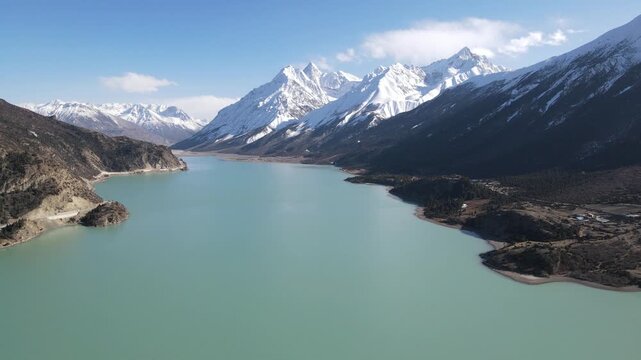 Cirle Aerial view of  Lake with Snow Mountains, Tibetan Plateau, China
