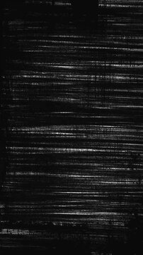 Vertical texture of pencil hatching on a wall with ink strokes.