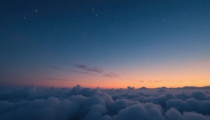 Breathtaking starry night sky above fluffy clouds at sunset