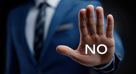 Businessman Showing Stop Gesture with &ldquo;NO&rdquo; Message
