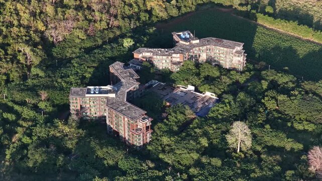 Aerial View of Abandoned Resort Overgrown by Tropical Jungle in Thailand