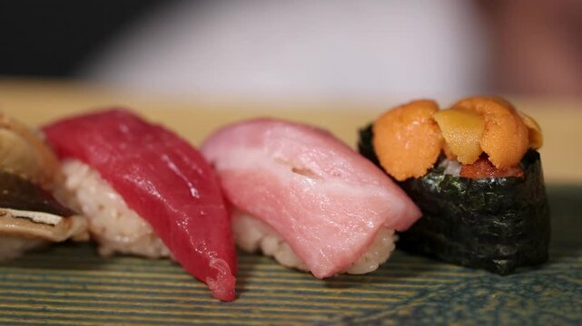 Traditional Omakase Sushi Set with Tuna Nigiri and Uni Gunkan