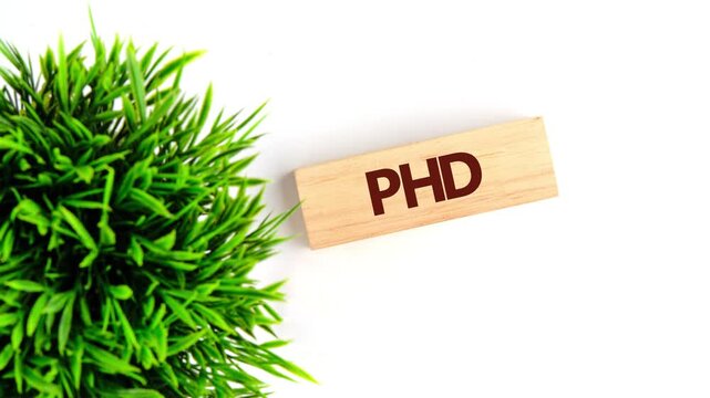 Animation, the appearance of a conceptual expression, PHD words on wooden blocks