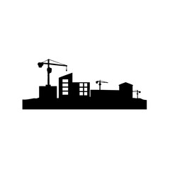 Silhouette of a city skyline with cranes under construction and buildings