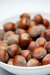 Bowl of dried fruit on a white background