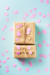 Valentines day concept with craft gift box and pink heart shape lollypop
