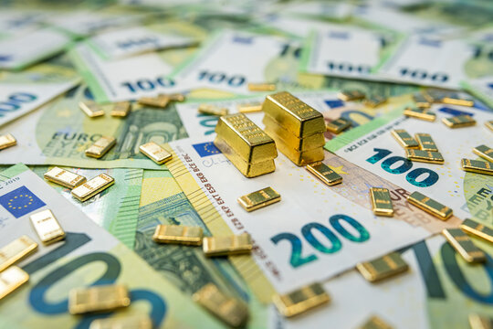 Euro money and gold bullion symbolizing economy trend, currency rate and financial performance