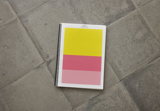 Mockup Of Spiral Bound Magazine With Customizable Front Cover