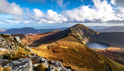Majestic Mountain Landscape with Serene Lake and Dramatic Clouds.