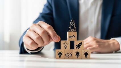 Businessman building a career growth concept with wooden blocks business man suit