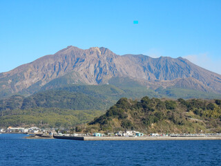 Obraz premium View of the ocean and Sakurajima Volcano
