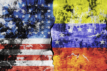 flag of the United States of America and the flag of Venezuela on the wall