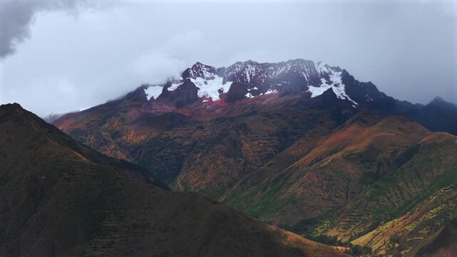 Peruvian Andes Mount Patacancha high altitude glacier Sacred Valley Chic&oacute;n Peru Per&uacute; aerial drone rainy season Maras Salt Mine cloudy Quelccaya Urubamba range cusco region parallax right motion