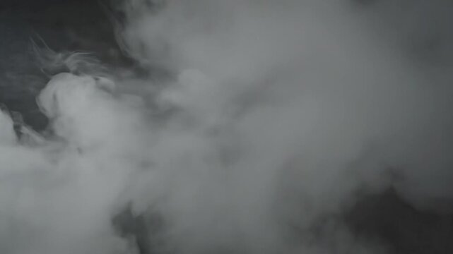 White Smoke Clouds on Black Background.