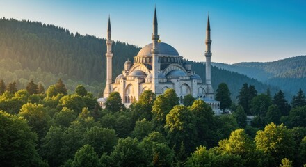 Naklejka premium A large white mosque with a large dome and two minarets surrounded by green trees and mountains