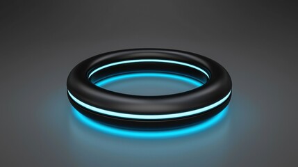 A futuristic black ring with glowing blue lines.