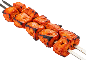 grilled orange glazed chicken skewers on metal skewers