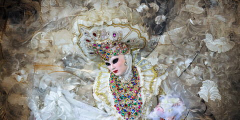 a beautiful mask and a fantastic costume on a white background