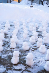 duck-shaped figures made of snow, conspiracy games, cold season molded snow figures of ducks and dragons, winter, children's outdoor games
