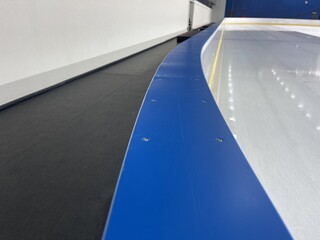 ice arena board in empty ice stadium