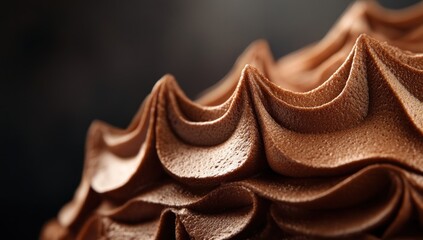 Extreme Close-up of Rich Chocolate Frosting Swirls and Peaks, Showing Detailed Texture