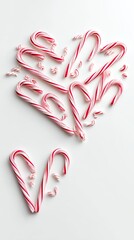 Candy Cane Heart: A delightful arrangement of candy canes, creatively forming a heart shape, evoking feelings of affection and warmth. Perfect for expressing love and joy.