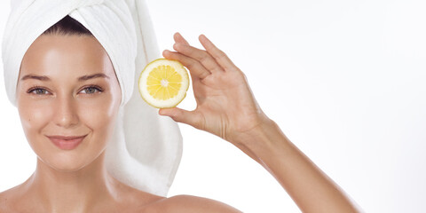 Fresh Skincare Woman With Towel Turban Holding Bright Lemon Slice