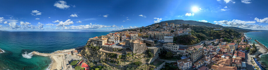 Aerial view of Pizzo Calabro, pier, castle, Calabria, tourism Italy. Panoramic view of the small town of Pizzo Calabro by the sea. Houses on the rock. On the cliff stands the Murat Aragonese castle