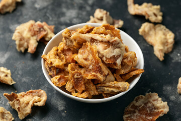 Crispy Fried Mushroom chips, snack in a white bowl