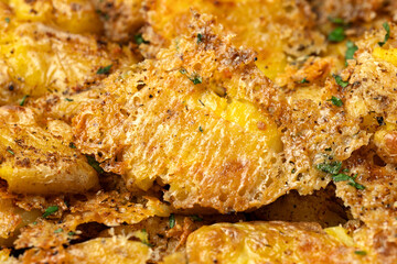 Crispy Parmesan smashed potato, background, texture