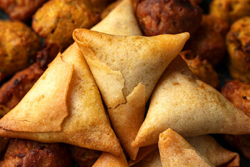 Indian Style Snack Selection with onion bhajis, pakoras and samosas