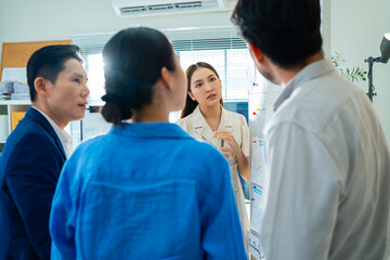 Teamwork meeting,tablet and asian business people in office workplace.Collaboration,technology and workers,men or employees with planning sales on laptop,financial strategy or research in company