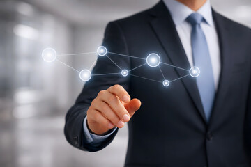 Man in suit touching a luminous digital network businessman