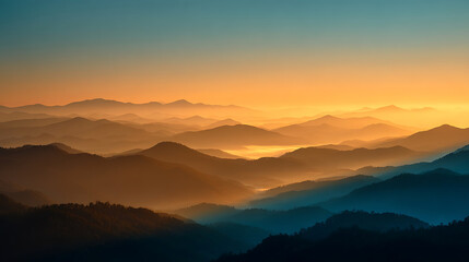 Fototapeta premium Hazy Mountain Landscape at Sunset with Golden Light