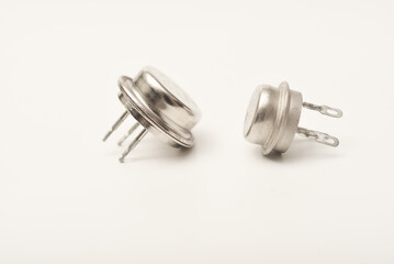 An old bipolar transistor.  A bipolar transistor in a metal case. A powerful transistor.