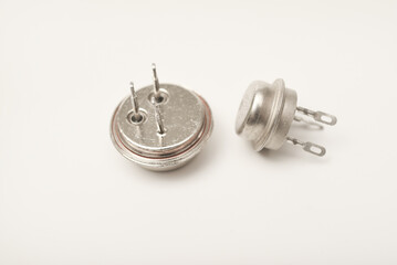 An old bipolar transistor.  A bipolar transistor in a metal case. A powerful transistor.