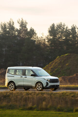 Modern electric SUV with green plate