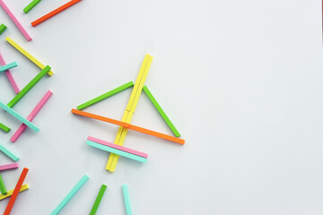 Concept image of a forming an airplane metaphor. Idea of leadership and education