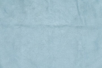 Light blue soft fabric texture with subtle folds  © balogh