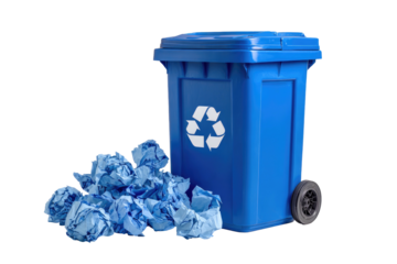 Blue recycling bin with lid and wheel, beside a pile of crumpled blue paper