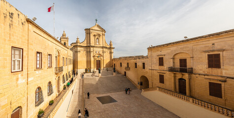 The grand facade of the Cathedral of the Assumption in the Cittadella of Victoria, Gozo, featuring...
