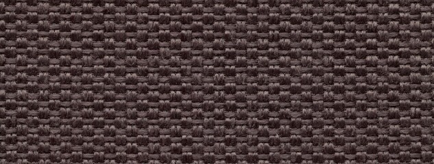 Dark brown woven textile macro texture background. Knitted fabric pattern for material design and backdrop